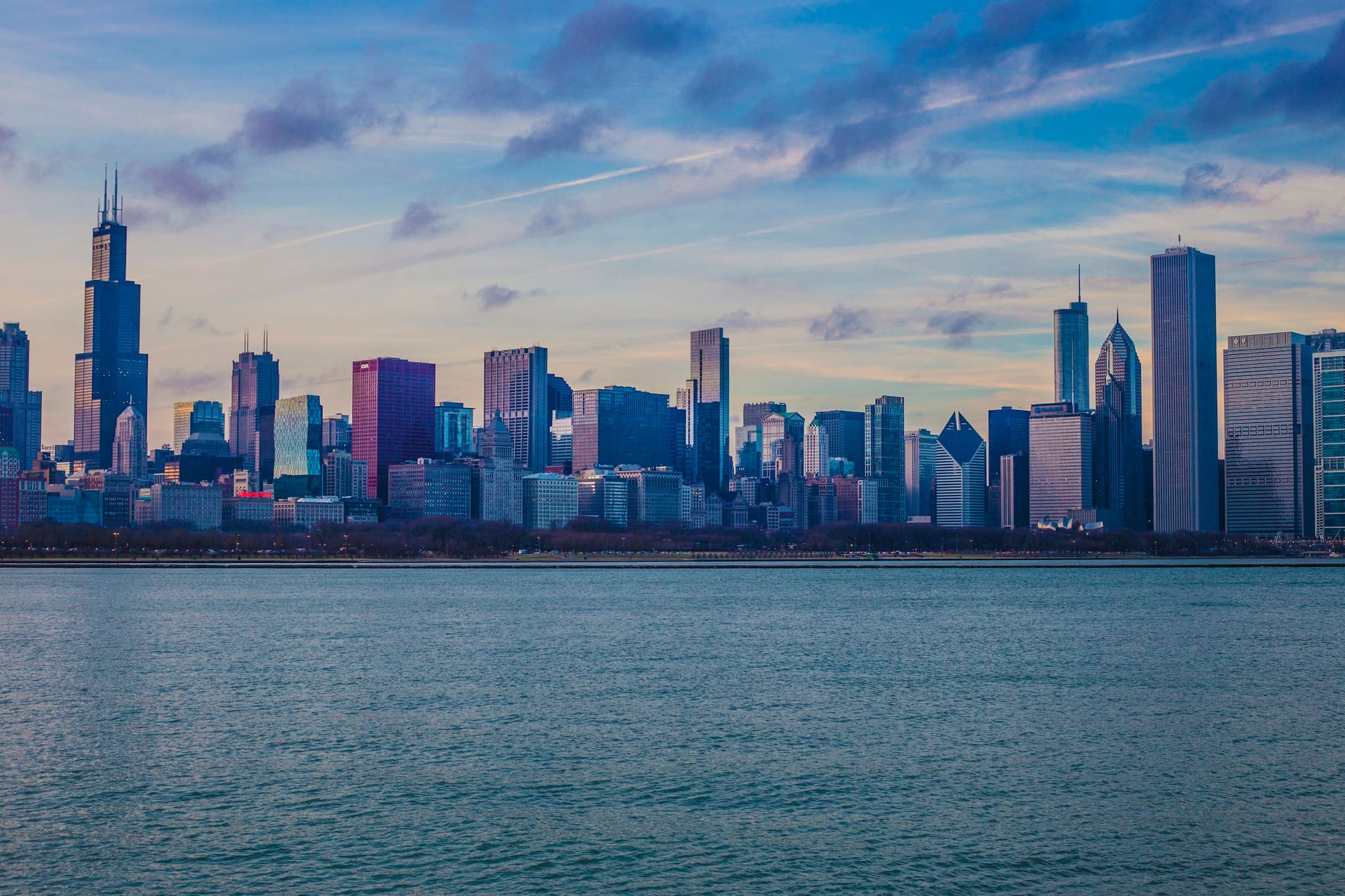 Chicago skyline along Lake Michigan at dusk